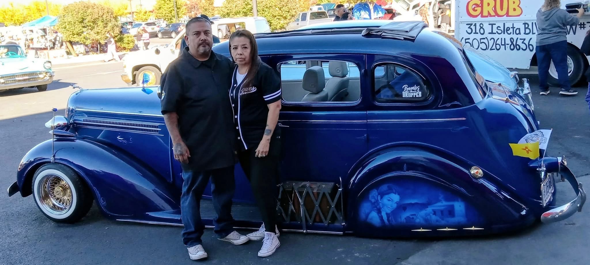 Classic lowrider car at a community car show